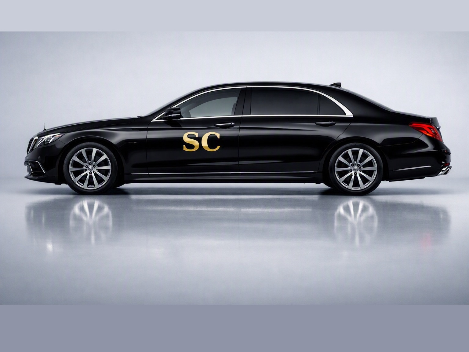 Stansted Cab executive car, side view with door livery